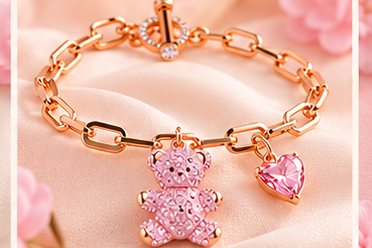 Roségouden schakelarmband met beertje en hart