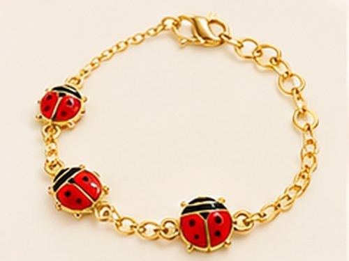 Gouden armbandje met drie rode lieveheersbeestjes