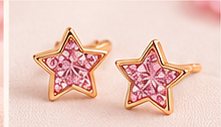 Ster oorbellen met roze steentjes